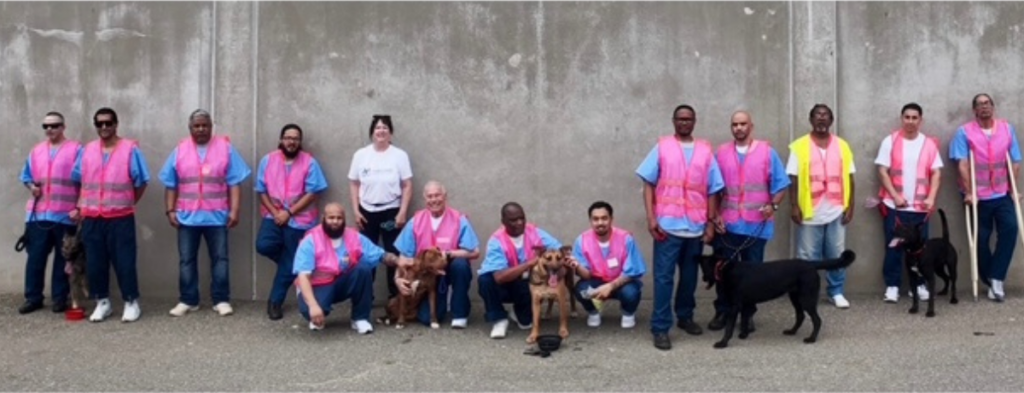 The first Stars & Stripes Dog Rescue Pawsitive Outlook Program team at California State Prison – Sacramento in July of 2026.